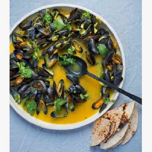 Golden Mussels, lime & chilli butter in arrack - Wunder Workshop